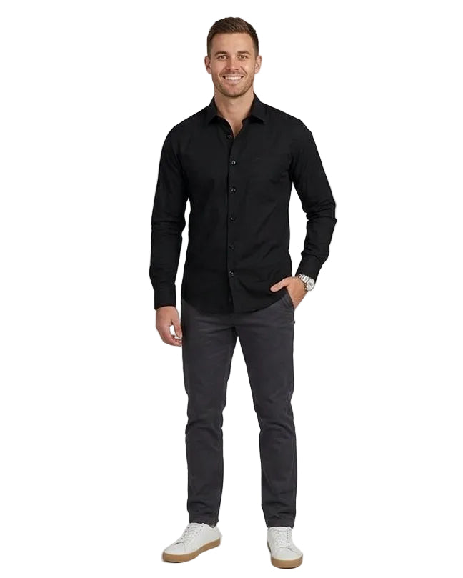 A man modeling a black long-sleeve button-down shirt with dark gray jeans and white sneakers, shown in a side-by-side split screen against a light gray studio background.