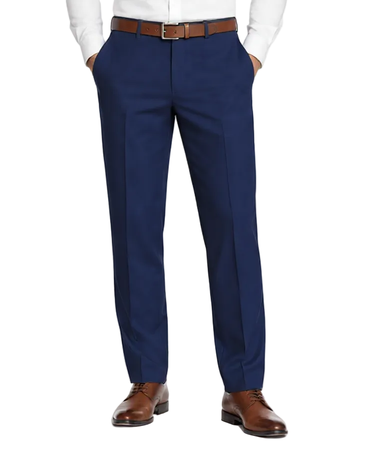 A man modeling a white long-sleeve dress shirt and navy blue dress pants with a brown belt and brown leather dress shoes, photographed against a clean white studio background.