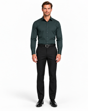 Load image into Gallery viewer, A side-by-side comparison of a man modeling a dark green long-sleeve button-down shirt with black trousers, shown from the front on the left and a three-quarter pose on the right, against a plain white studio background.